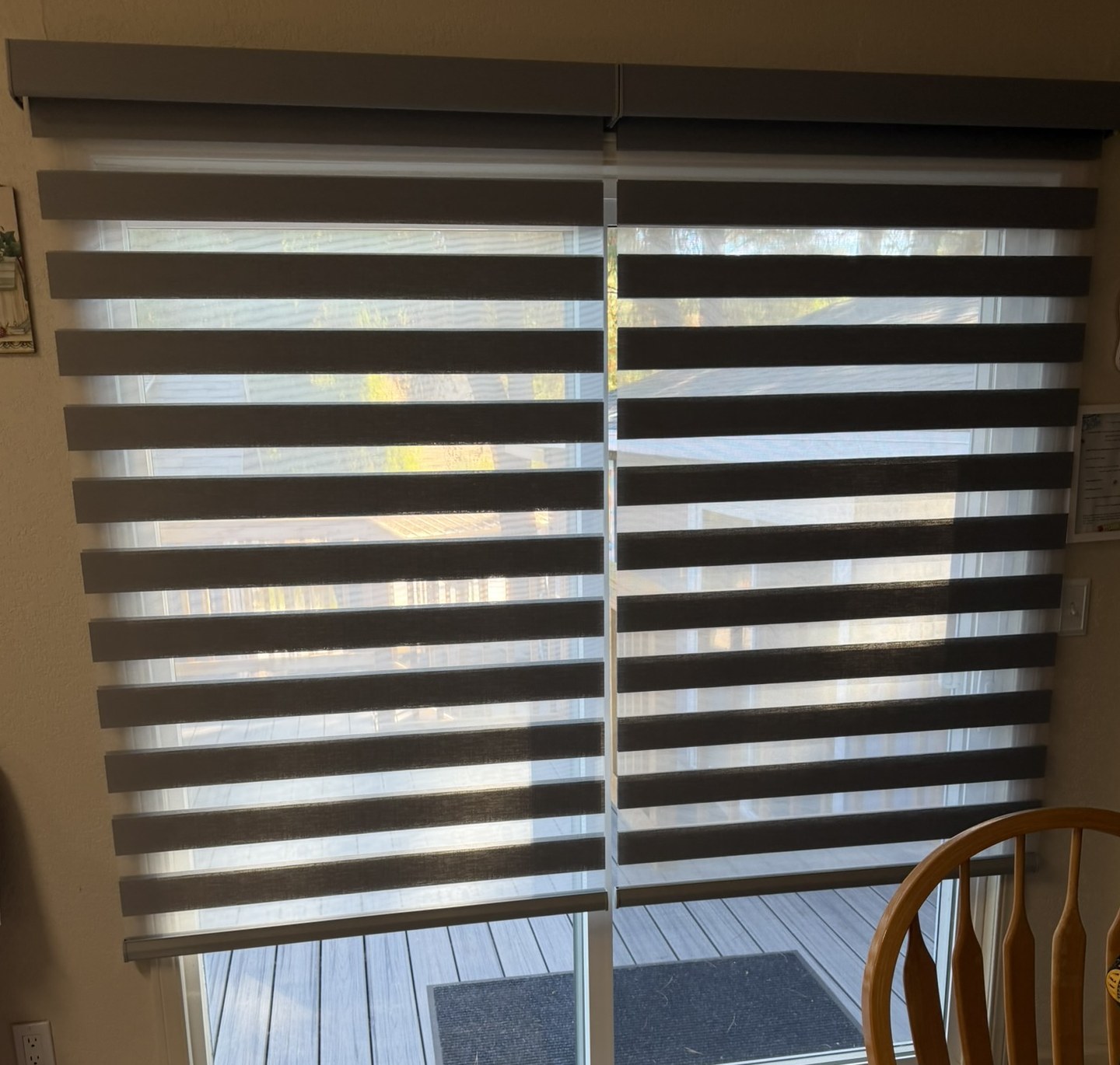 Zebra shades installed on the same sliding patio door after replacement